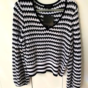 Knitted long-sleeve black and white sweater